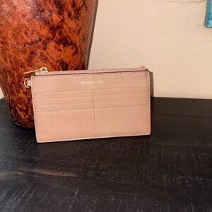 Michael Kors beige leather card wallet with multiple sleeves & zippered middle